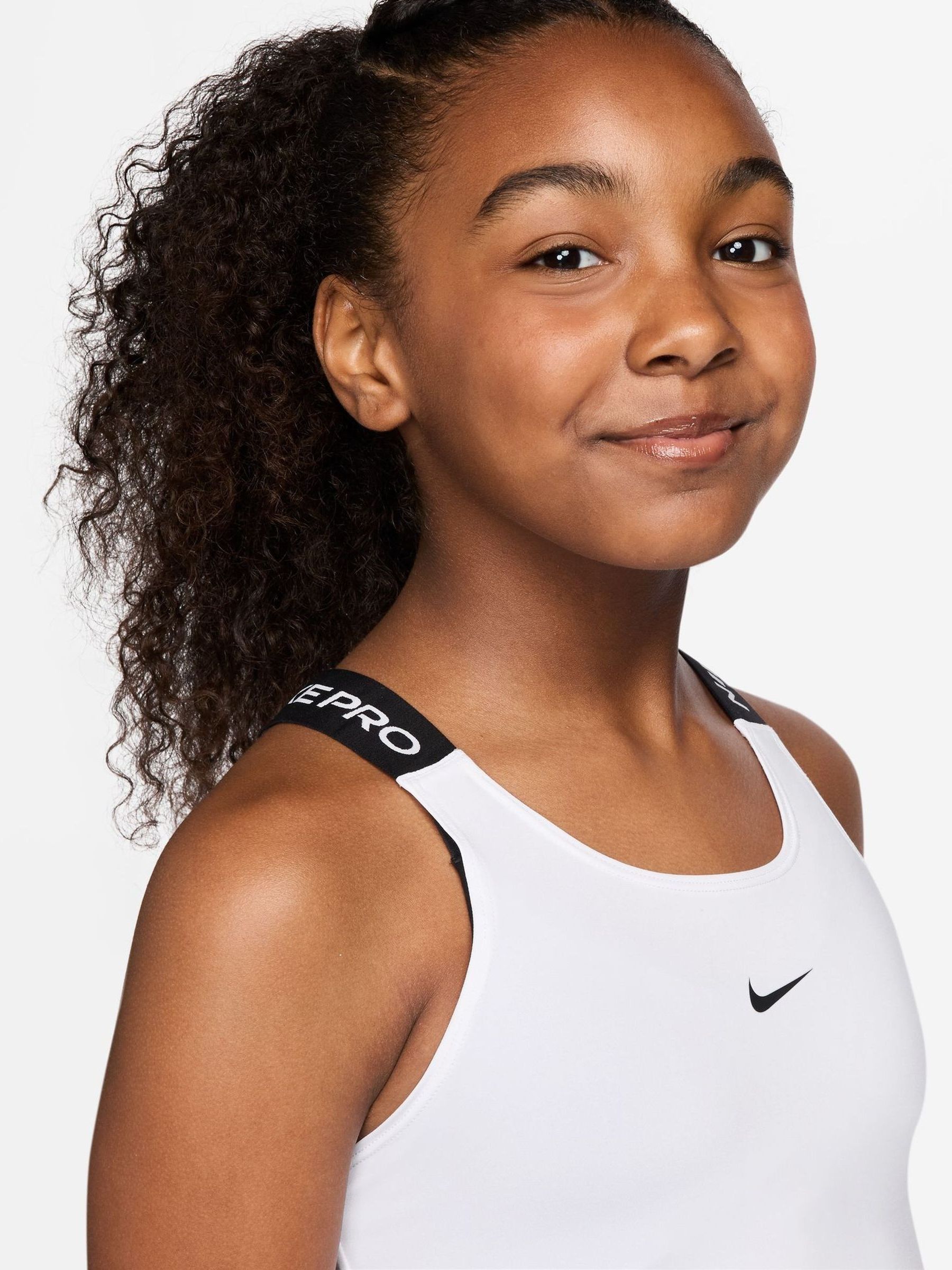 NIKEPROショート丈ロゴタンクトップ Next：日本 ホワイト - Nike Pro Dri-FIT タンクトップ from Next Japan