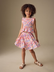 زهور زاهي - طقم متناسق مكون من رداء علوي وتنورة (للأطفال 3 سنوات-16سنة) - صورة 1 من 10