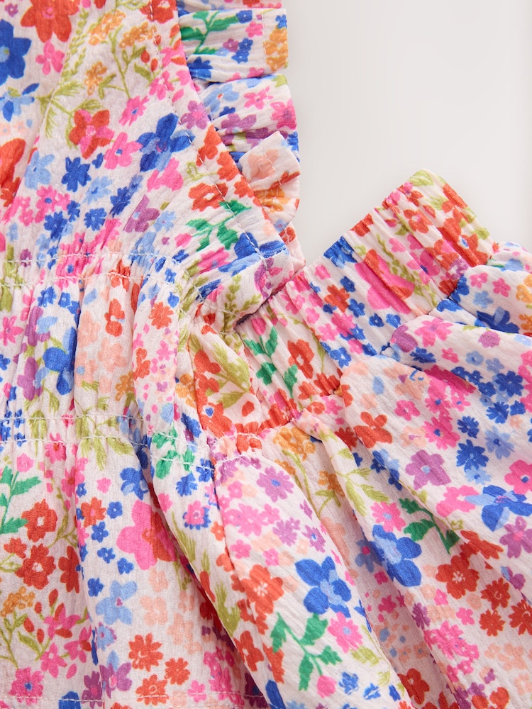 زهور زاهي - طقم متناسق مكون من رداء علوي وتنورة (للأطفال 3 سنوات-16سنة) - صورة 10 من 10