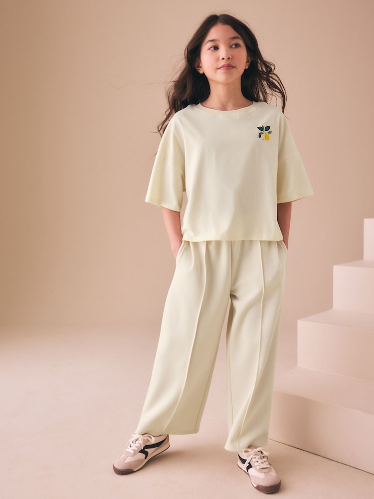 Cream Fruit Graphic T-Shirt and Wide Leg Trousers Set (3-16yrs) - Image 1 of 9