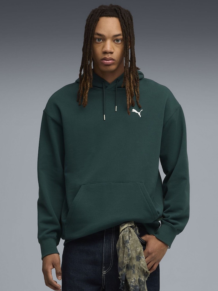 Puma Green WARDROBE ESS Mens Relaxed Hoodie - Image 1 of 5 Puma Green WARDROBE ESS Mens Relaxed Hoodie - Image 1 of 5