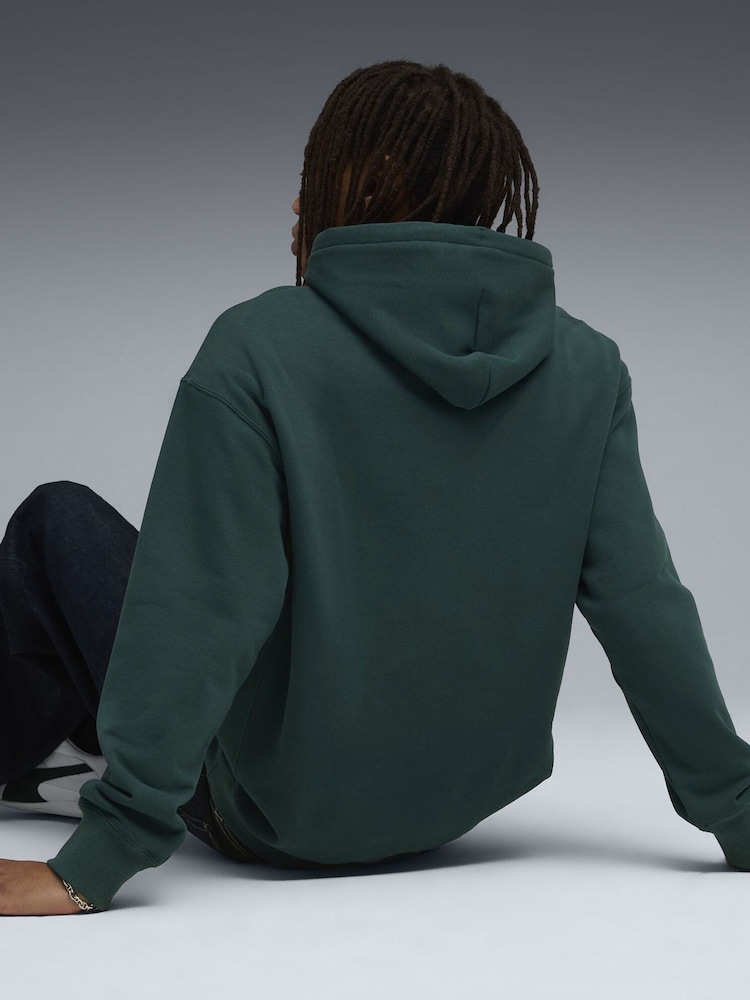 Puma Green WARDROBE ESS Mens Relaxed Hoodie - Image 2 of 5 Puma Green WARDROBE ESS Mens Relaxed Hoodie - Image 2 of 5