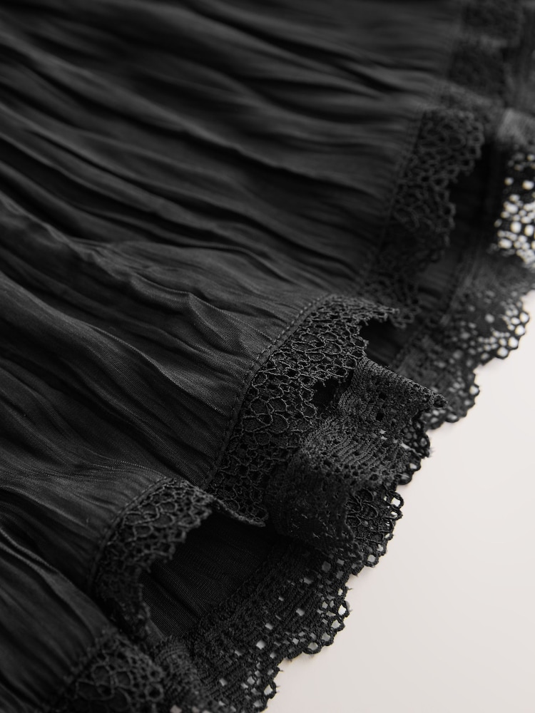 أسود - تنورة قصيرة ذات طبقات مجعدة - صورة 11 من 11 أسود - تنورة قصيرة ذات طبقات مجعدة - صورة 11 من 11