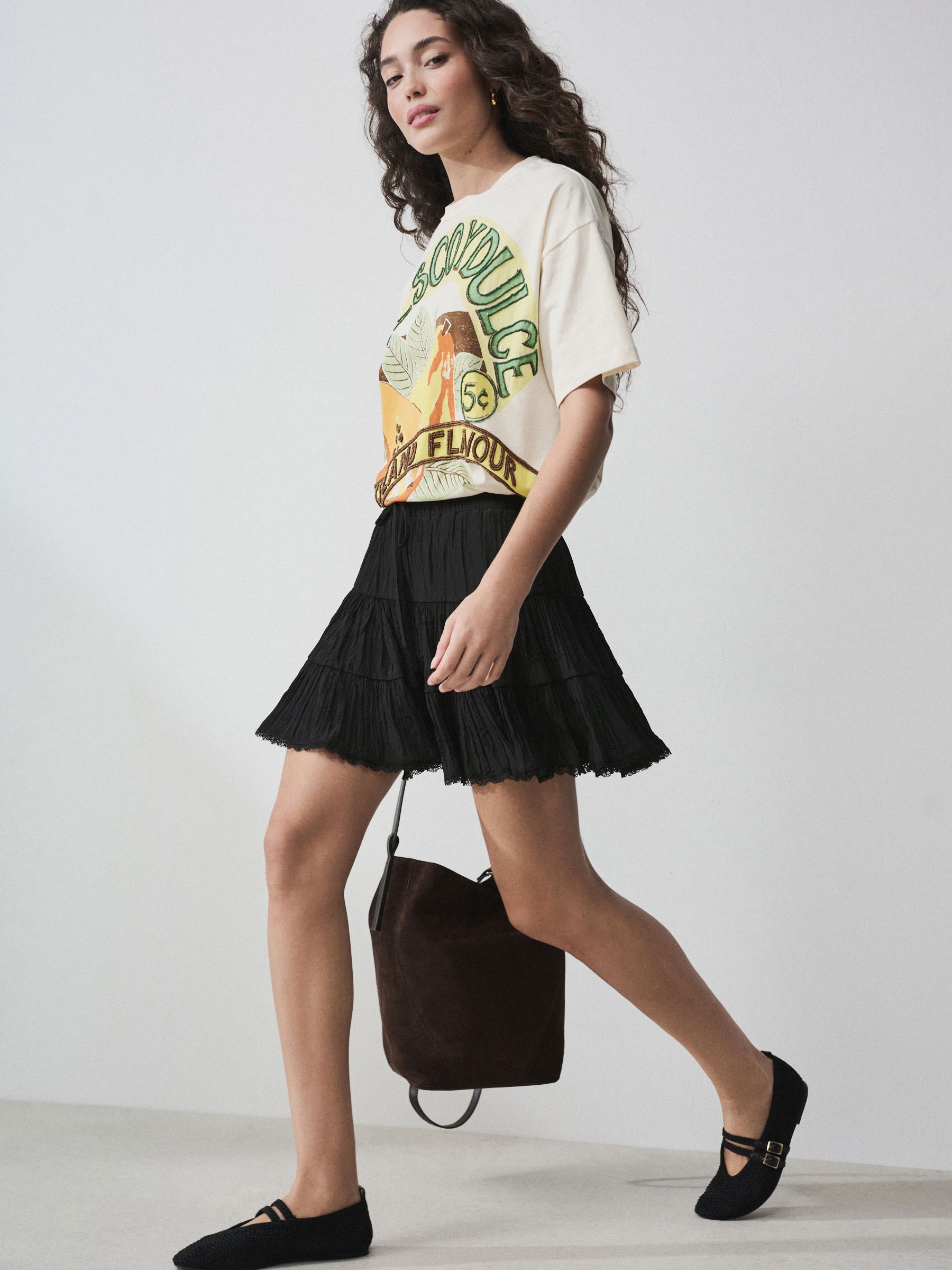 Buy Black Crushed Tiered Mini Skirt from the Next UK online shop