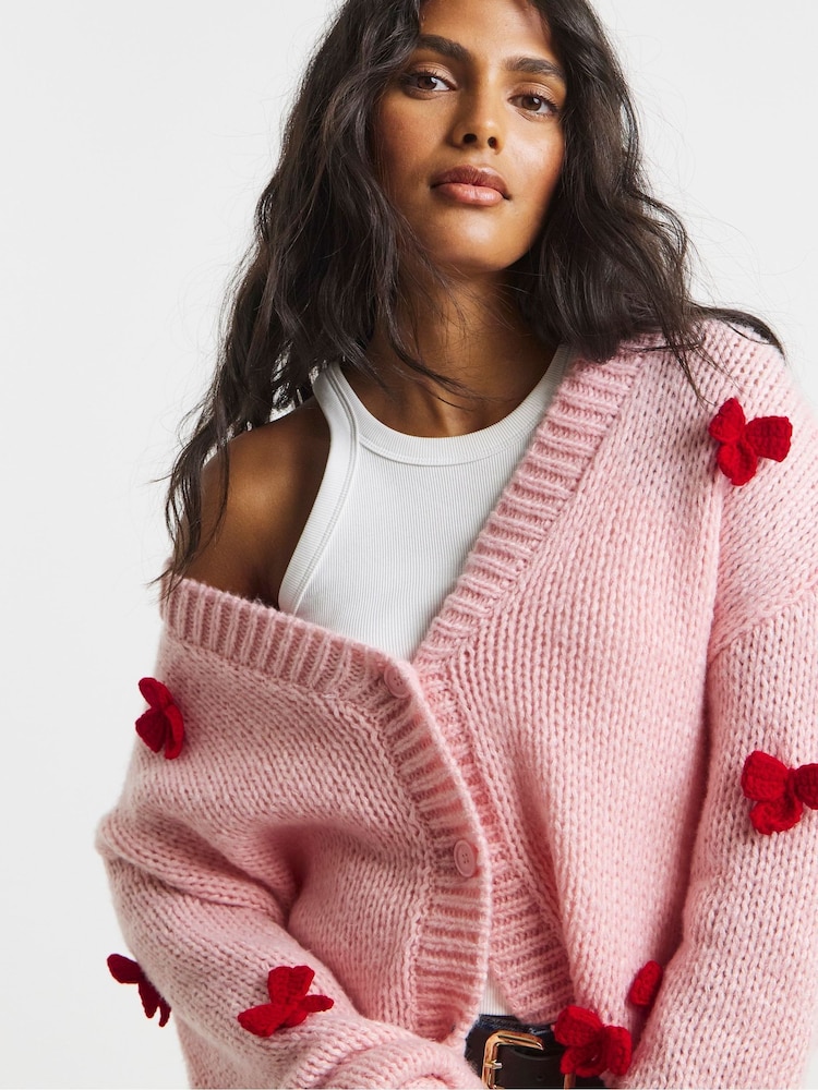 Buy Simply Be Pink Chunky 3D Bow Knitted Cardigan from the Next UK
