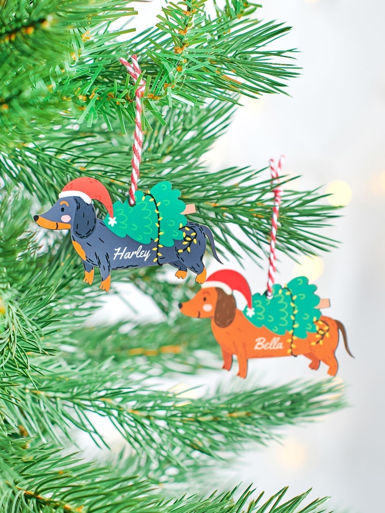 Pesonalised Sausage Dog Christmas Decoration by Oakdene - Image 1 of 1 Pesonalised Sausage Dog Christmas Decoration by Oakdene - Image 1 of 1