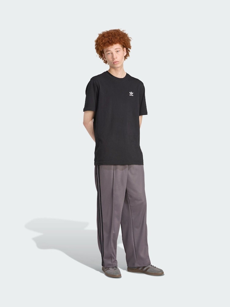 adidas Originals Grey Adicolor Baggy Fit Firebird Track Trousers - Image 1 of 5 adidas Originals Grey Adicolor Baggy Fit Firebird Track Trousers - Image 1 of 5