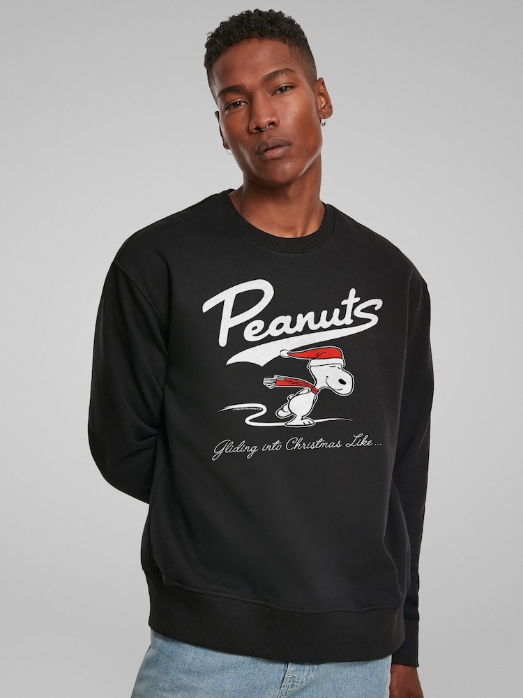 All + Every Black Peanuts Snoopy Gliding Into Christmas Like Sweatshirt - Image 1 of 4 All + Every Black Peanuts Snoopy Gliding Into Christmas Like Sweatshirt - Image 1 of 4