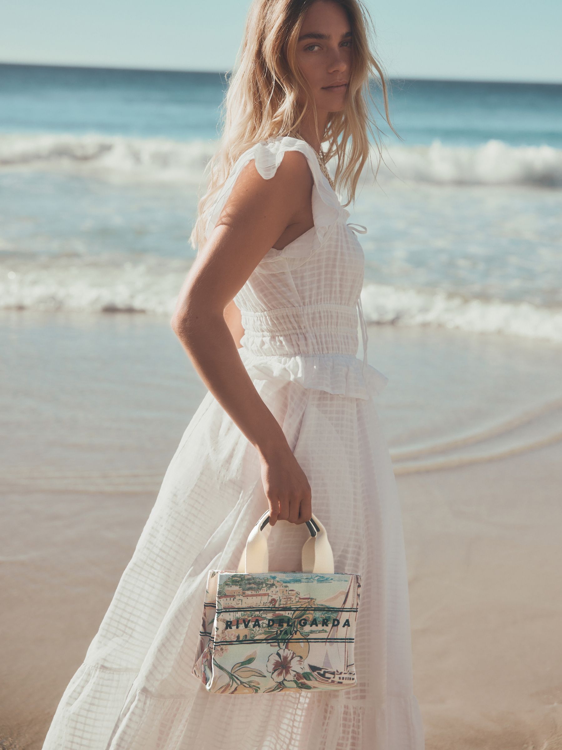 Buy Floral Print Raffia Effect Cross-Body Bag from Next Republic