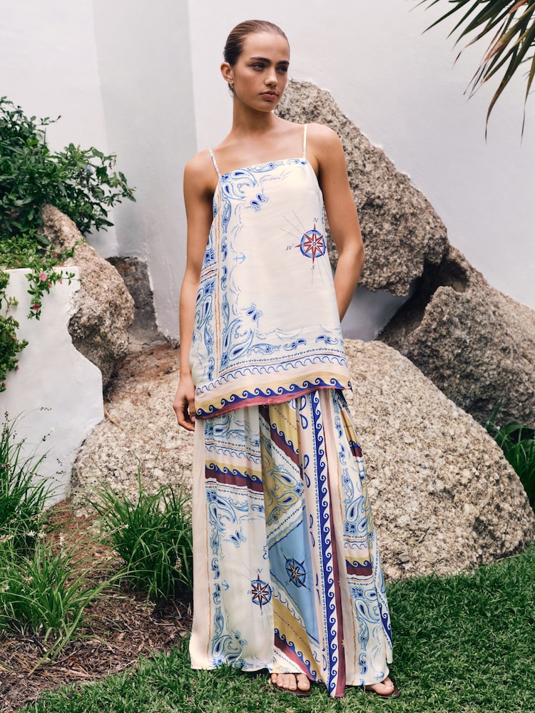 كريمي/أزرق مطبوع - كاميسول ساتان - صورة 1 من 8