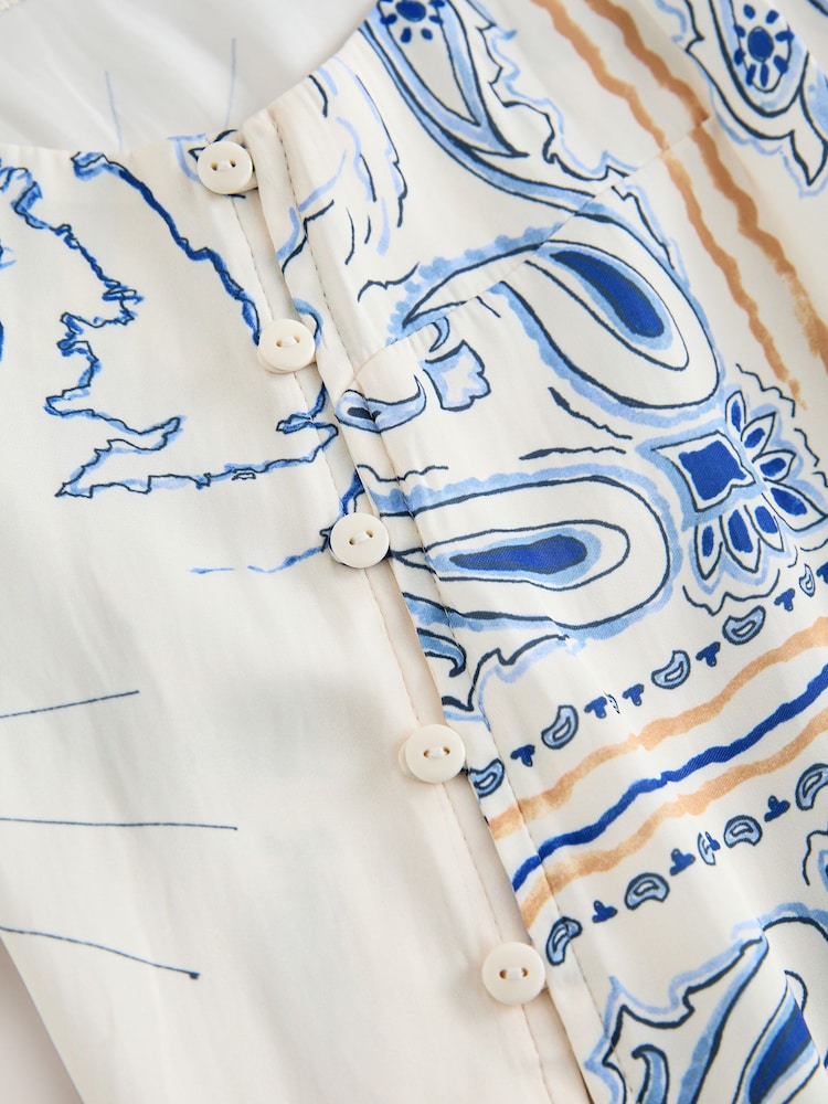 كريمي/أزرق مطبوع - كاميسول ساتان - صورة 8 من 8