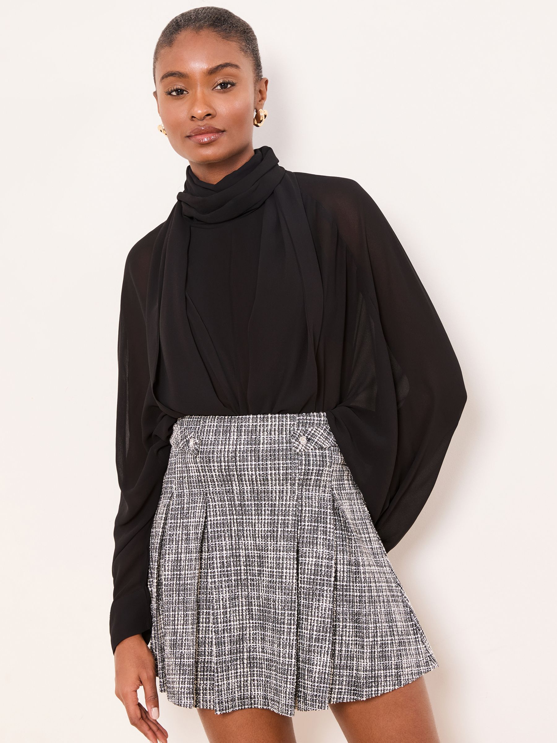 Buy Lipsy Monochrome Boucle Pleated Mini Skirt from Next Republic