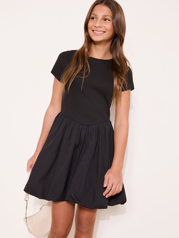 Lipsy Black Short Sleeve 2-in-1 Puffball Dress (5-16yrs) - Image 1 of 5
