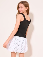 Lipsy Black/White 2-in-1 Polka Dot Puffball Hem Dress (10-16yrs) - Image 4 of 4