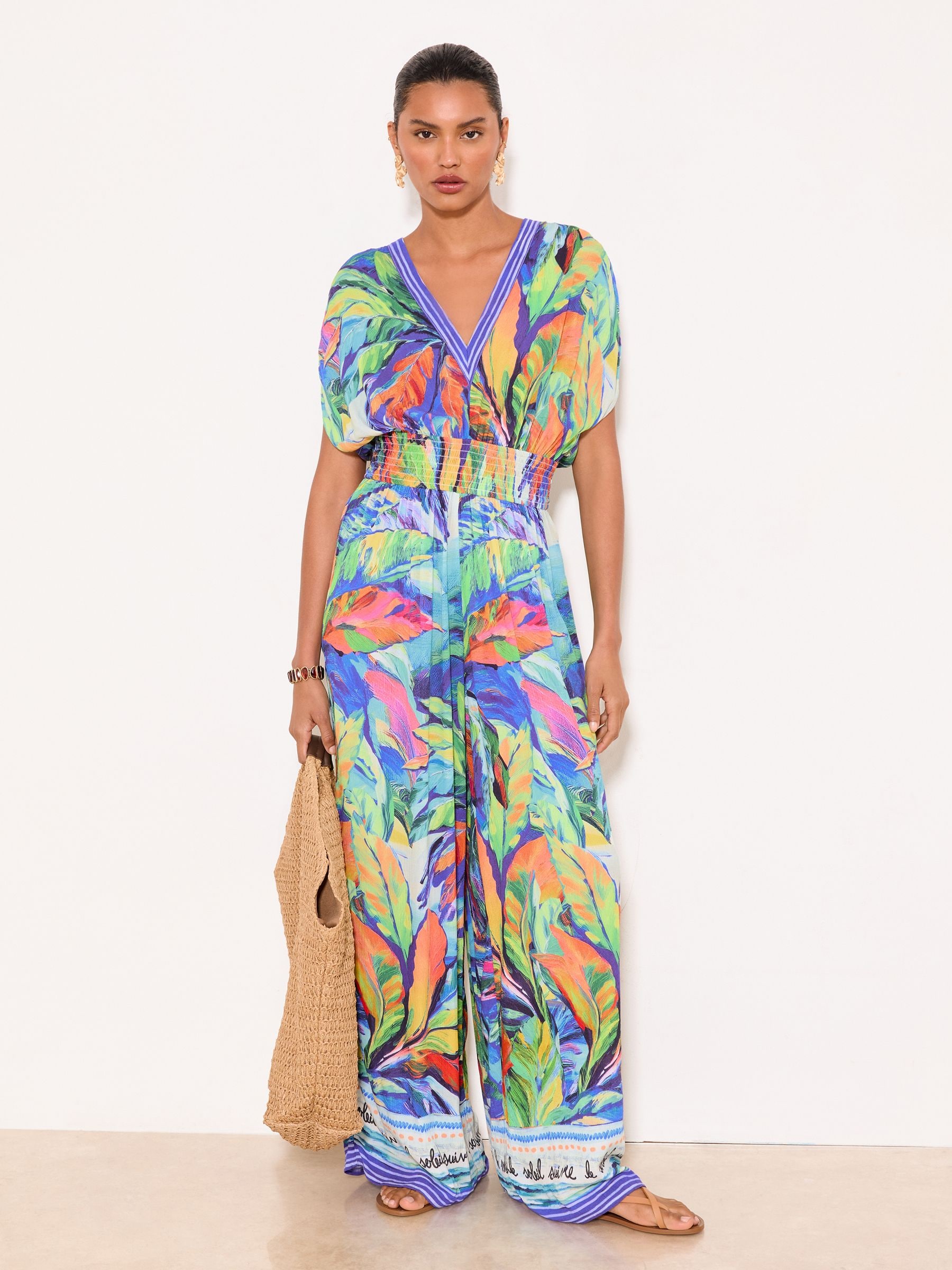Buy Lipsy Blue Tropical Crinkle Cap Sleeve Jumpsuit from Next Jordan