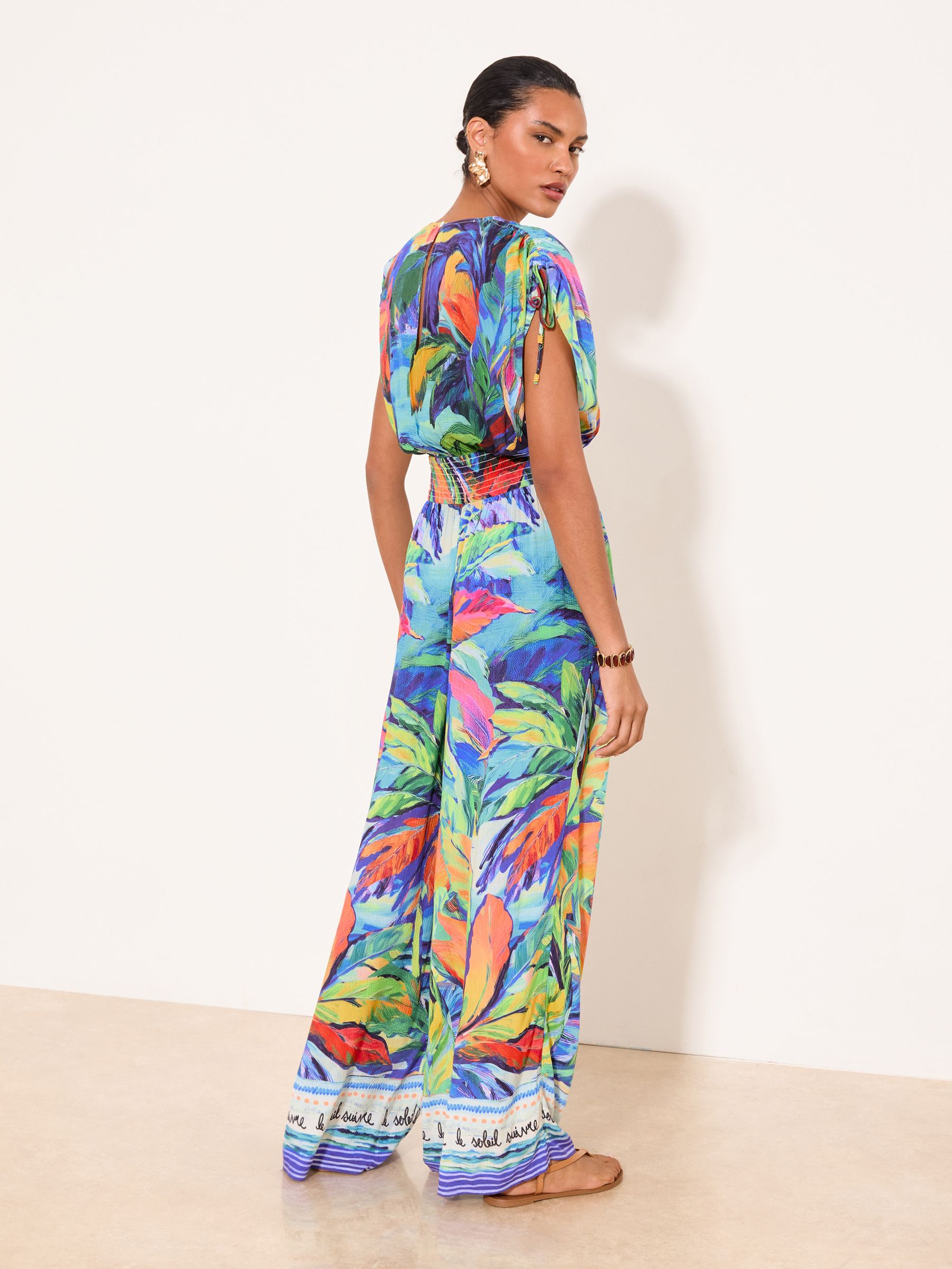 Buy Lipsy Blue Tropical Crinkle Cap Sleeve Jumpsuit from Next Jordan