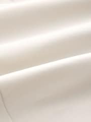 بيج فاتح - reguläre Passform mit schmal zulaufendem Bein - بنطلون تشينو قابل للتمدد غني بالقطن - صورة 10 من 10