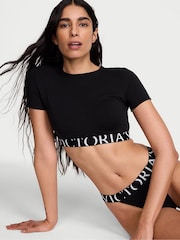 Victoria's Secret Black Cotton Exploded Logo Short Sleeve Bralette Top - Image 1 of 3