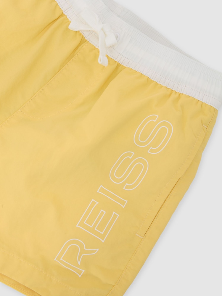 Reiss Yellow Ley 9-13 yrs Colour-Block Logo Swim Shorts - Image 1 of 3 Reiss Yellow Ley 9-13 yrs Colour-Block Logo Swim Shorts - Image 1 of 3