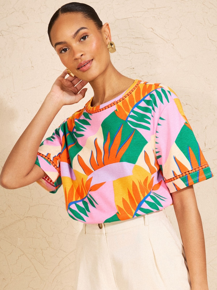 Love & Roses Orange Tropical Print Crochet Trim Crew Neck Boxy T-Shirt - Image 1 of 4