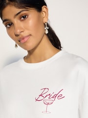 Estampado nupcial blanco - Vestido de novia de lentejuelas con camiseta de manga corta - Imagen 5 de 9