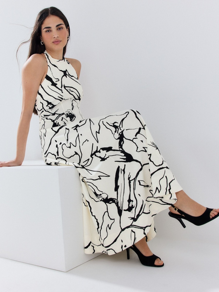 black and white floral halter dress New Black and White Floral Fit And Flare Halter Neck Dress