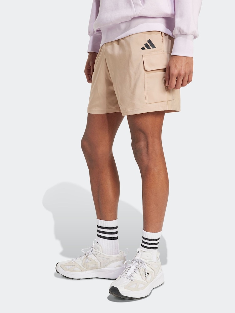 adidas Brown Essentials Small Logo Cargo Chelsea Shorts - Image 1 of 5 adidas Brown Essentials Small Logo Cargo Chelsea Shorts - Image 1 of 5