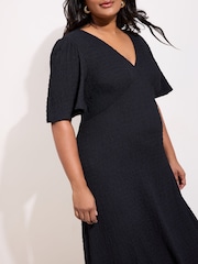Negru - Friends Like These Textured Jersey V-Neck Midi Dress - Imaginea 3 din 4