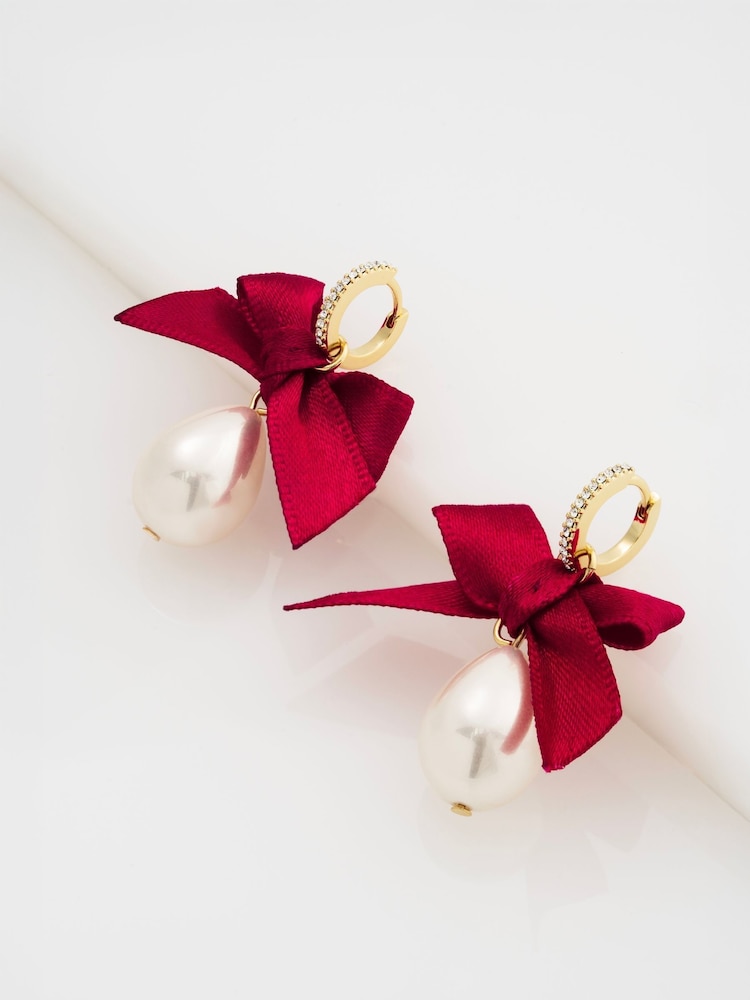 Ted Baker Gold Tone Riyya: Ribbon Bow Pearl Drop Huggie Earrings - Image 1 of 4 Ted Baker Gold Tone Riyya: Ribbon Bow Pearl Drop Huggie Earrings - Image 1 of 4
