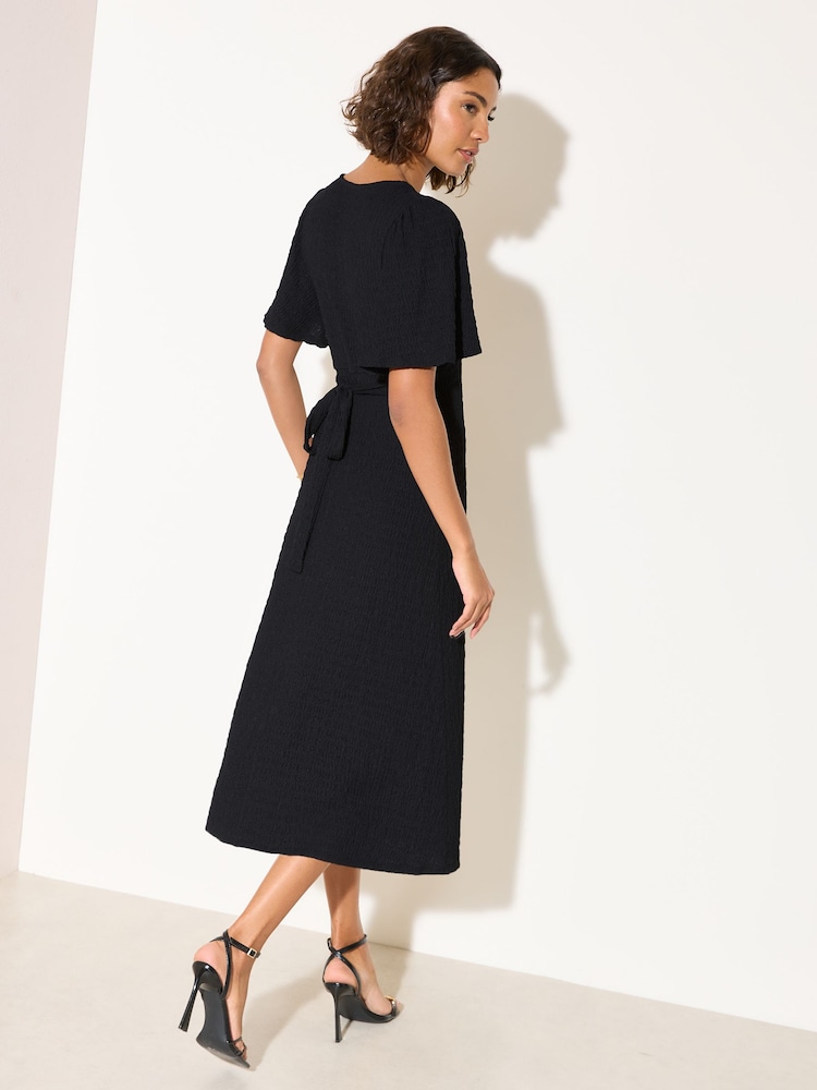 Friends Like These Black Petite Textured Jersey V-Neck Midi Dress - Image 4 of 4 Friends Like These Black Petite Textured Jersey V-Neck Midi Dress - Image 4 of 4