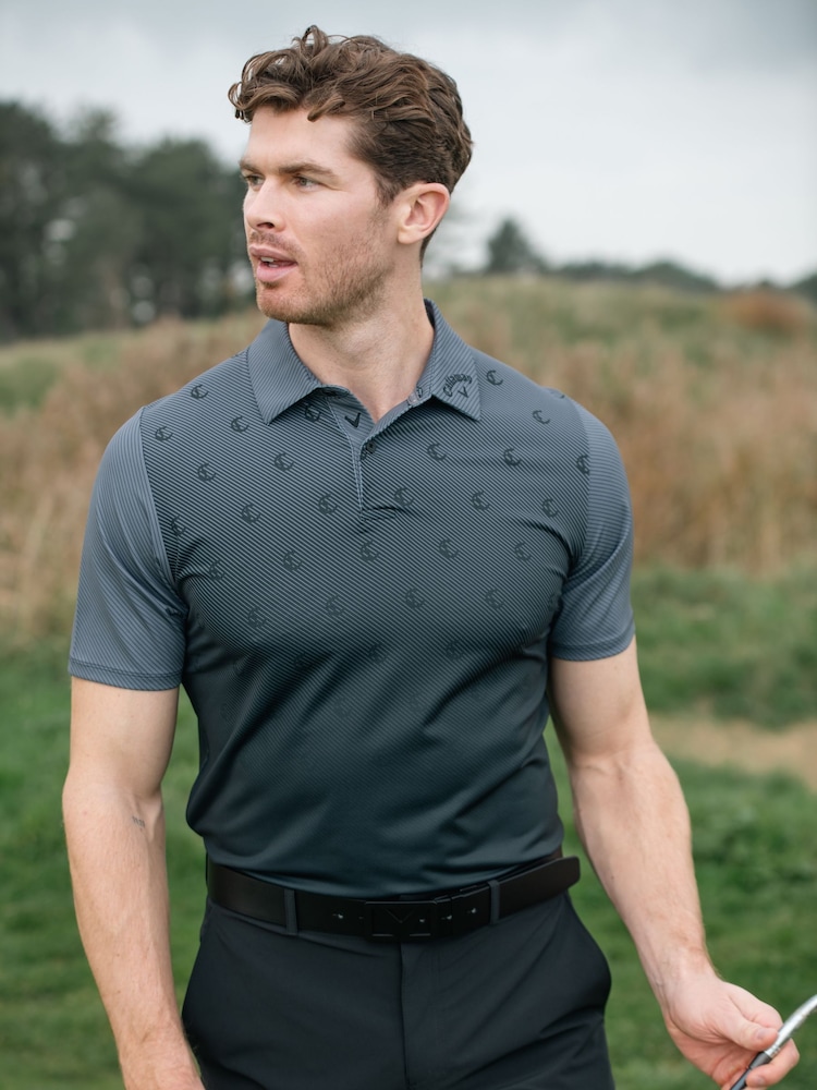 Callaway Apparel Emea Short Sleeve Eng Chev Twill Print Black Polo Shirt - Image 1 of 6 Callaway Apparel Emea Short Sleeve Eng Chev Twill Print Black Polo Shirt - Image 1 of 6