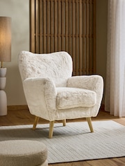 Oslo Faux Fur Light Natural Wilson Highback Armchair - Image 1 of 9