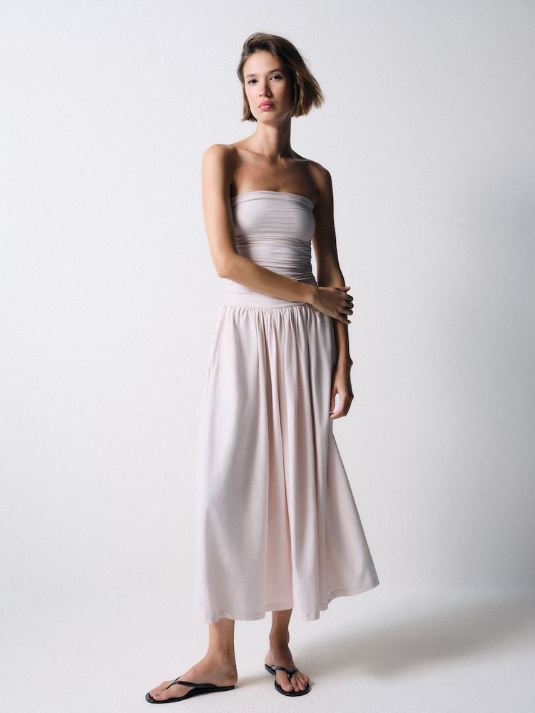 ruched bandeau midi dress in soft pink PrettyLittleThing Women's Polka Dot Woven Bandeau Ruched Skater Midaxi Dress in Candy Pink
