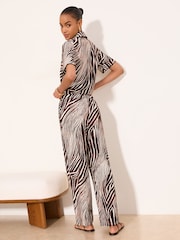 Lipsy Chocolate Brown Zebra Print Petite Crinkle Wide Leg Trousers - Image 4 of 4