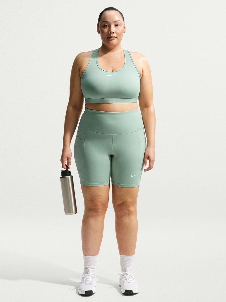 Nike Steam Green Curve Swoosh Medium Support Sports Bra - Image 1 of 5 Nike Steam Green Curve Swoosh Medium Support Sports Bra - Image 1 of 5