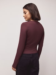 Burgundy Red Soft Touch Slinky Nylon Crew Neck Long Sleeve Top - Image 1 of 5