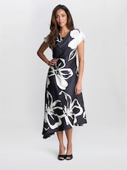 Gina Bacconi Maude Floral Print Asymmetrical Midi Black Dress - Image 1 of 6