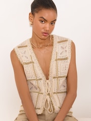Lipsy Cream/Gold Metallic Crochet Tie Front Knit Waistcoat - Image 1 of 5