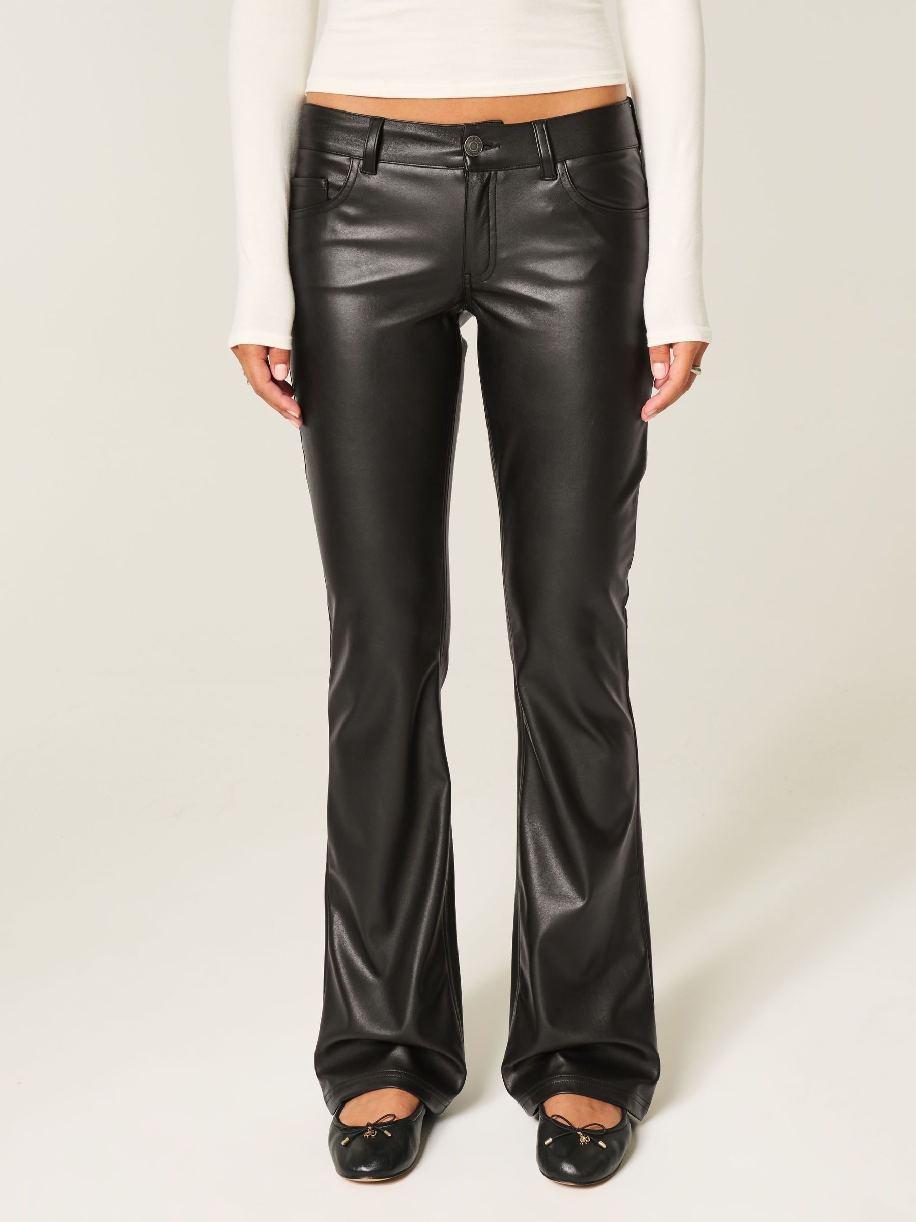 Buy Hollister Black Low Rise Bootcut Flare Faux Leather Trousers