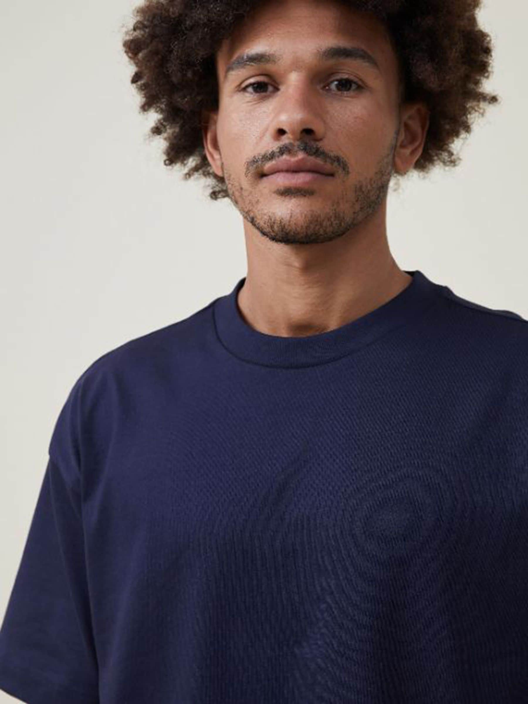 Next：日本 トゥルーネイビー - Cotton On ボックスフィット Tシャツ