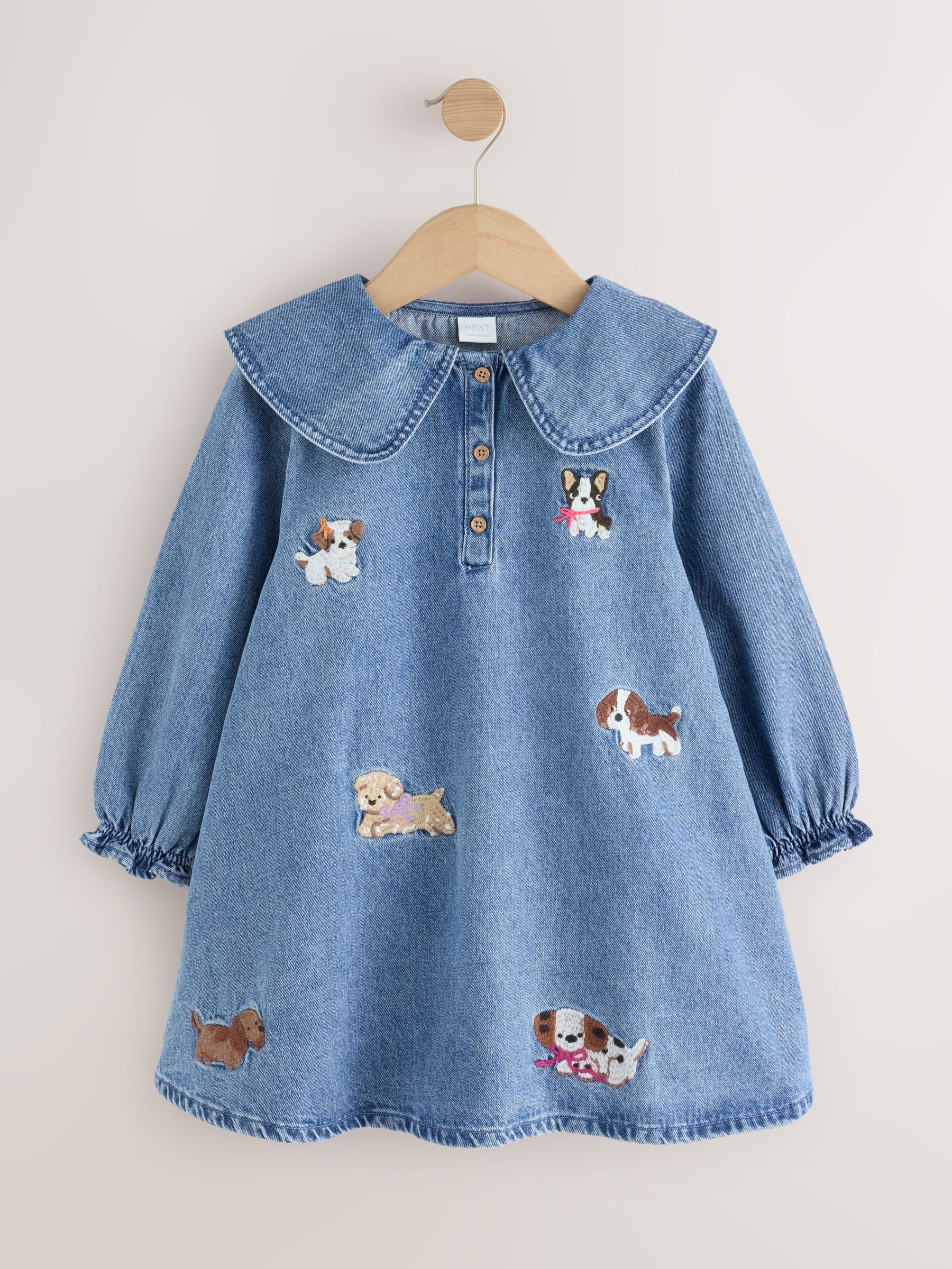 Next：日本 ブルーデニム - 刺繍入り犬キャラクターカラードレス（3か