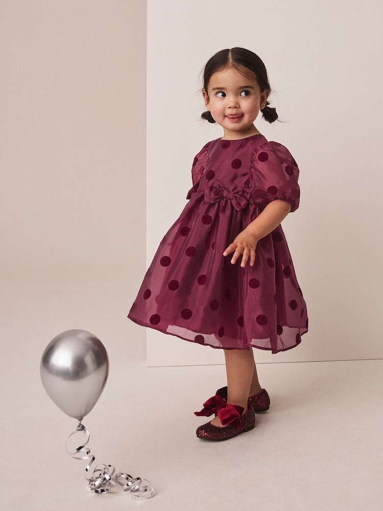 Burgundy Red Puff Sleeve Bow Detail Occasion Dress (3mths-8yrs) - Image 1 of 7 Burgundy Red Puff Sleeve Bow Detail Occasion Dress (3mths-8yrs) - Image 1 of 7