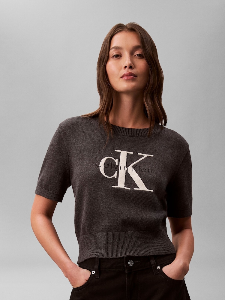 Calvin Klein Grey Monologo Cropped Jumper - Image 1 of 6 Calvin Klein Grey Monologo Cropped Jumper - Image 1 of 6