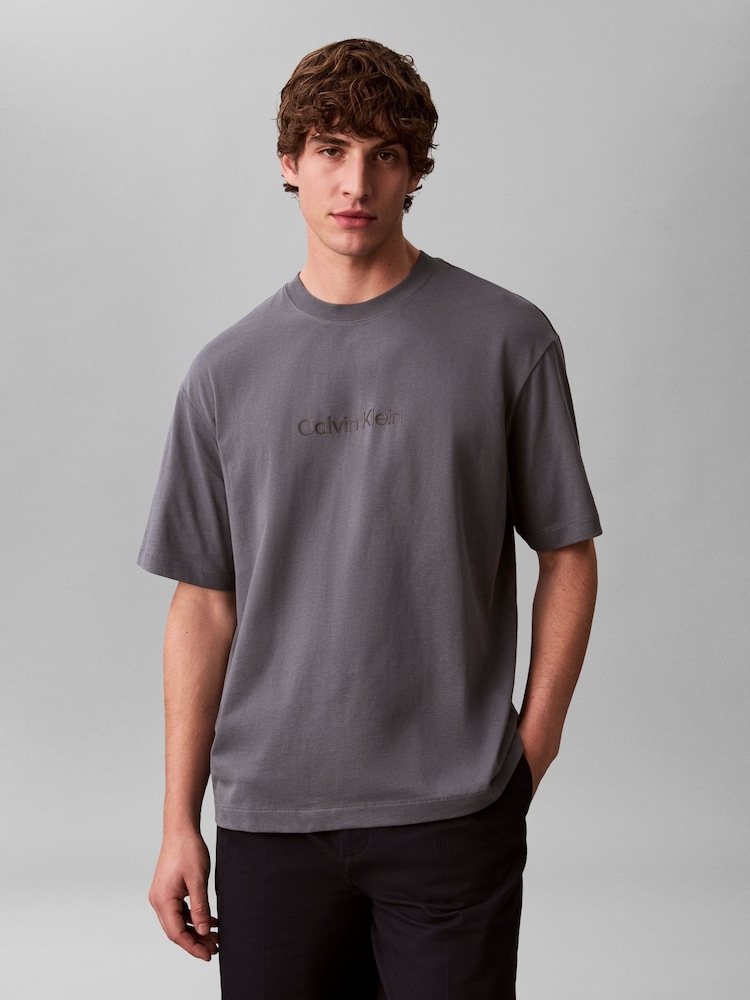 Calvin Klein Blue Short Sleeve Relaxed Standard Logo Crew Neck T-Shirt - Image 1 of 6 Calvin Klein Blue Short Sleeve Relaxed Standard Logo Crew Neck T-Shirt - Image 1 of 6