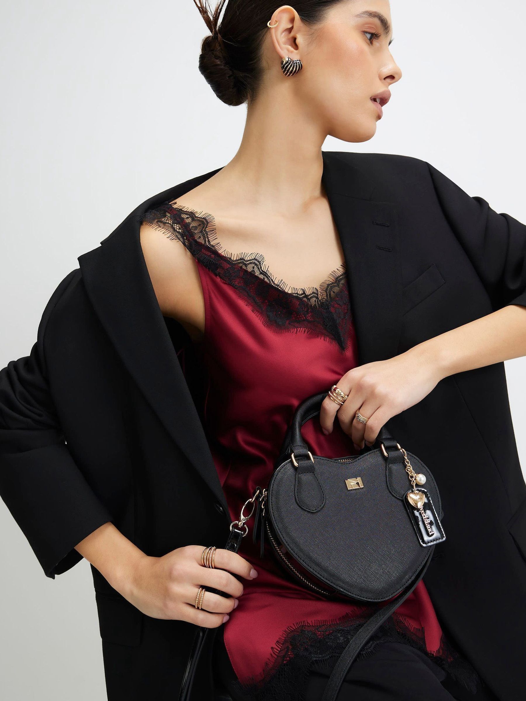 Buy River Island Black Heart Cross-Body Bag from Next Ireland