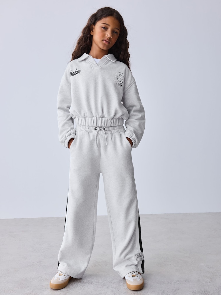 Baker by Ted Baker 2 Piece Varsity Rugby Sweat Top & Joggers Set - Image 1 of 12 Baker by Ted Baker 2 Piece Varsity Rugby Sweat Top & Joggers Set - Image 1 of 12