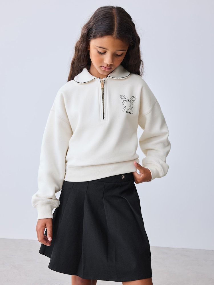 Baker by Ted Baker Cream 2 Piece Collared Sweat Top & Pleated Skirt Set - Image 1 of 13 Baker by Ted Baker Cream 2 Piece Collared Sweat Top & Pleated Skirt Set - Image 1 of 13
