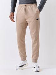 adidas Beige Essentials Feelcozy Fleece Joggers - Image 1 of 4