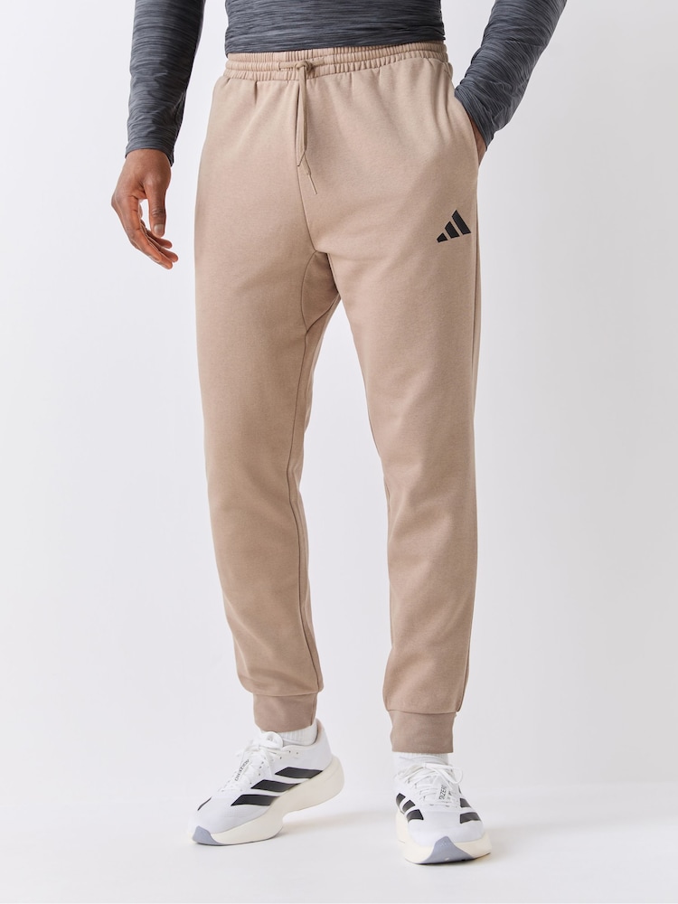 adidas Beige Essentials Feelcozy Fleece Joggers - Image 1 of 4