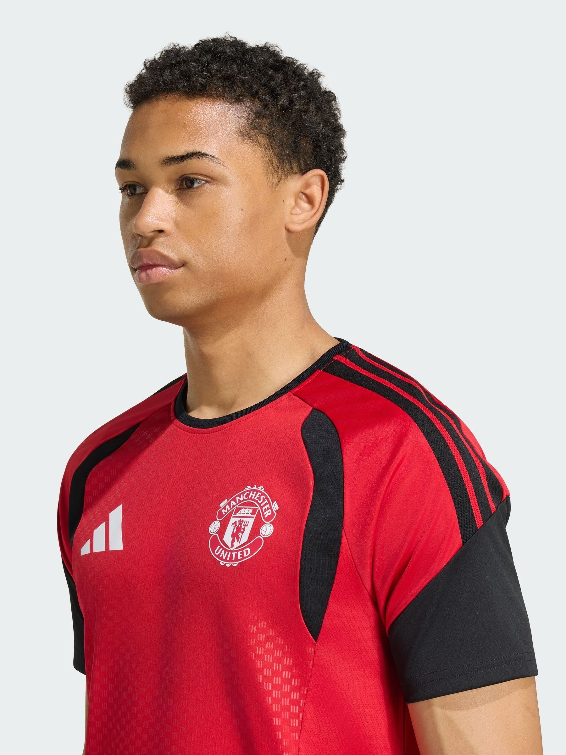 Buy adidas Red Manchester United 26/27 Tiro Training Jersey from